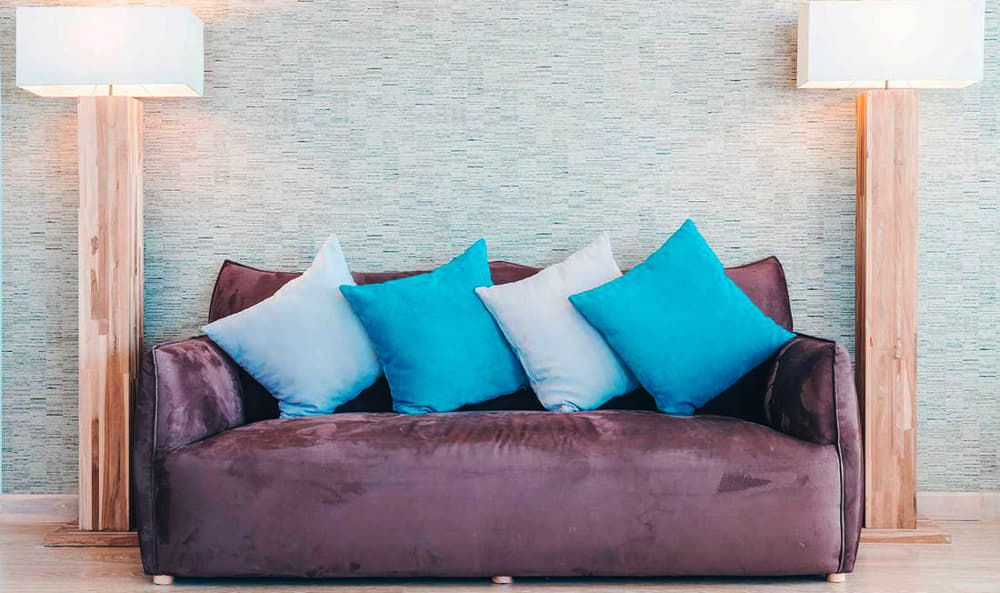 why do sofa cushions slide forward